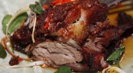 Caramalized sticky pork with siamese water cress and chilli vinegar
